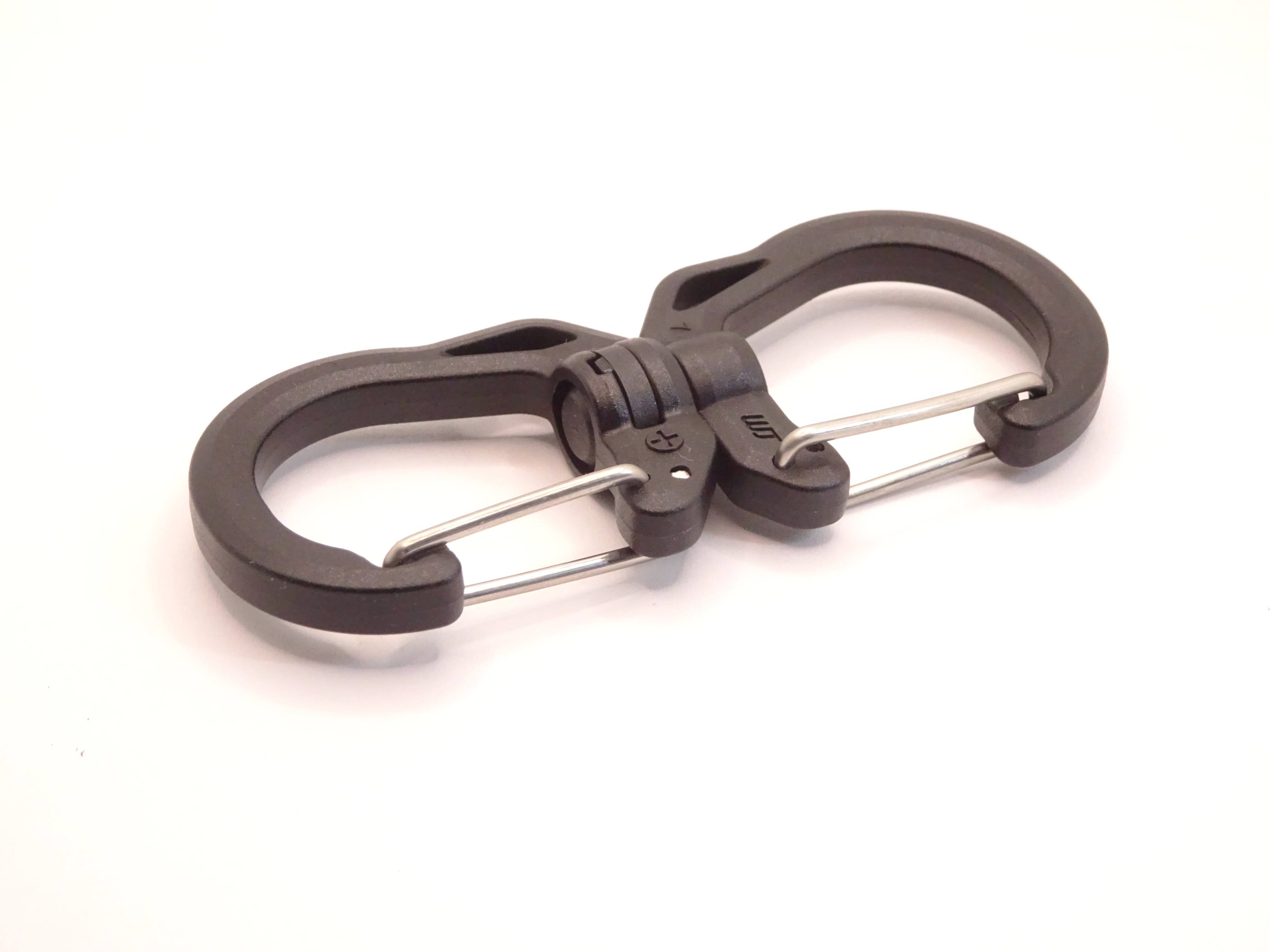 Mozet Supplies' double carabiner joined in the middle by a swivel point. Available in Small, Medium, and Large and in a variety of colors. Intended to secure lighter weight items and attach to backpacks. These are the same type as the ones from Tom Bihn!