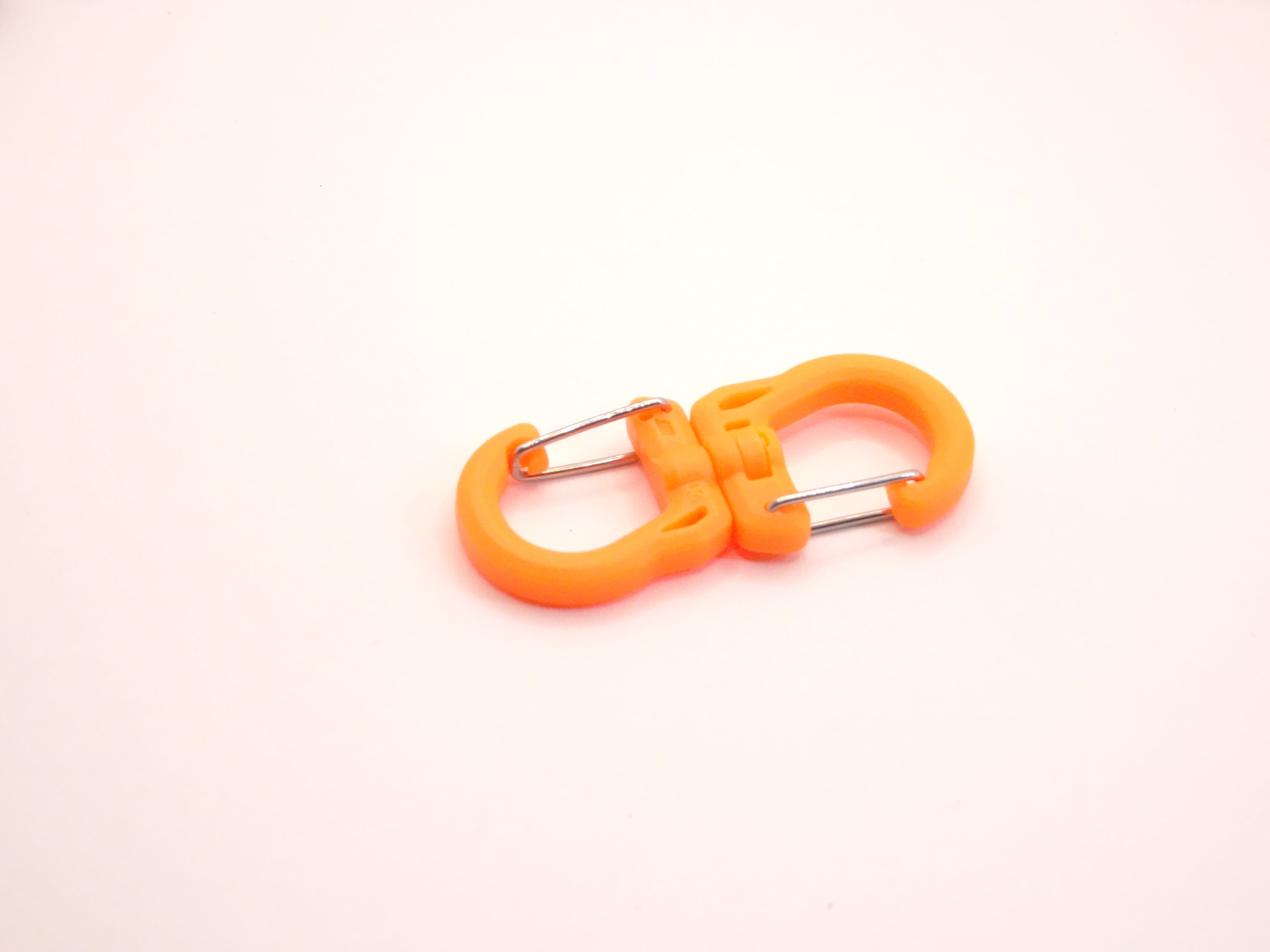 Mozet Supplies' double carabiner joined in the middle by a swivel point. Available in Small, Medium, and Large and in a variety of colors. Intended to secure lighter weight items and comes in a number of colors! These are the same type as the ones from Tom Bihn!