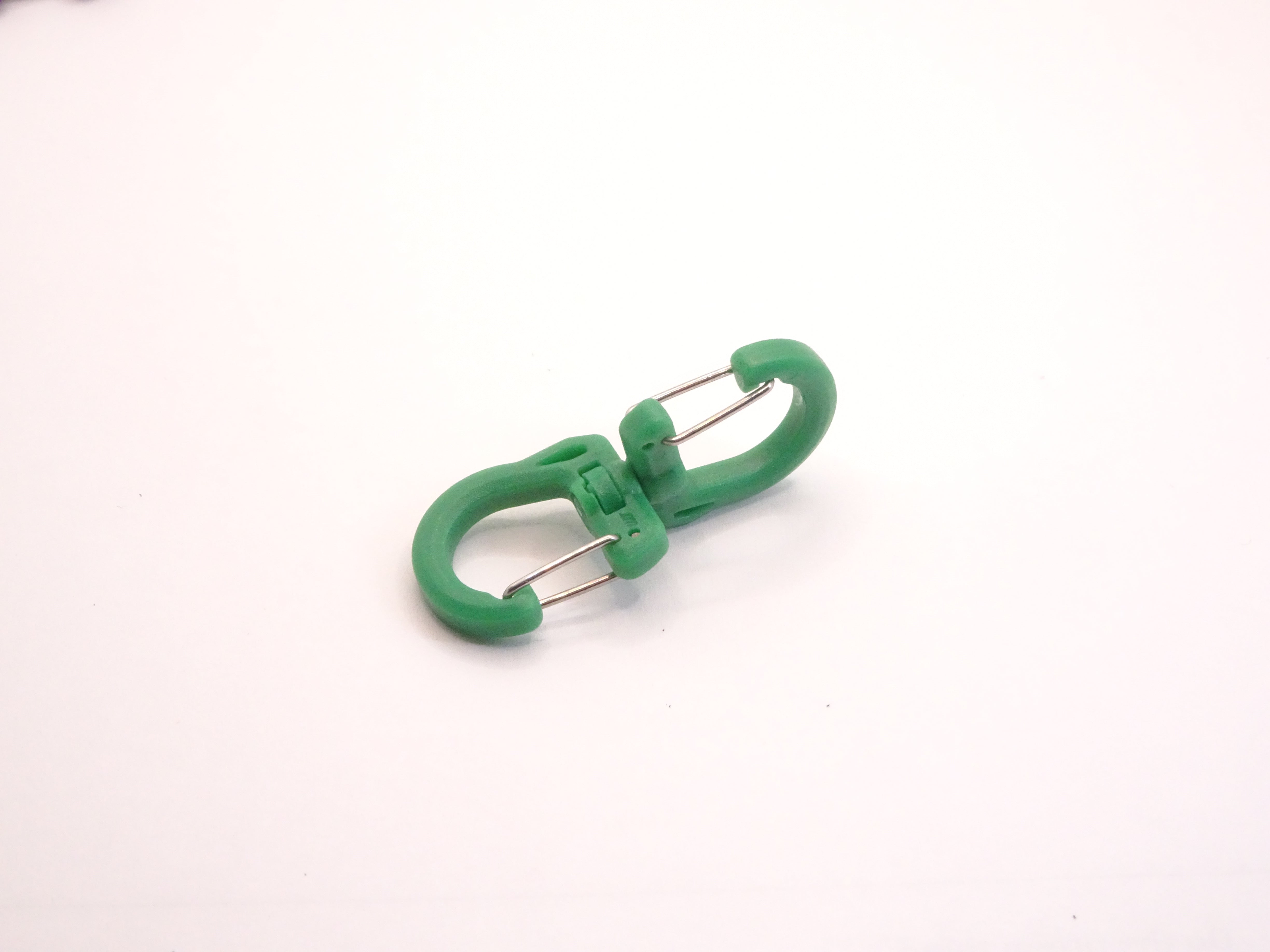 Mozet Supplies' double carabiner joined in the middle by a swivel point. Available in Small, Medium, and Large and in a variety of colors. Intended to secure lighter weight items and comes in a number of colors! These are the same type as the ones from Tom Bihn!