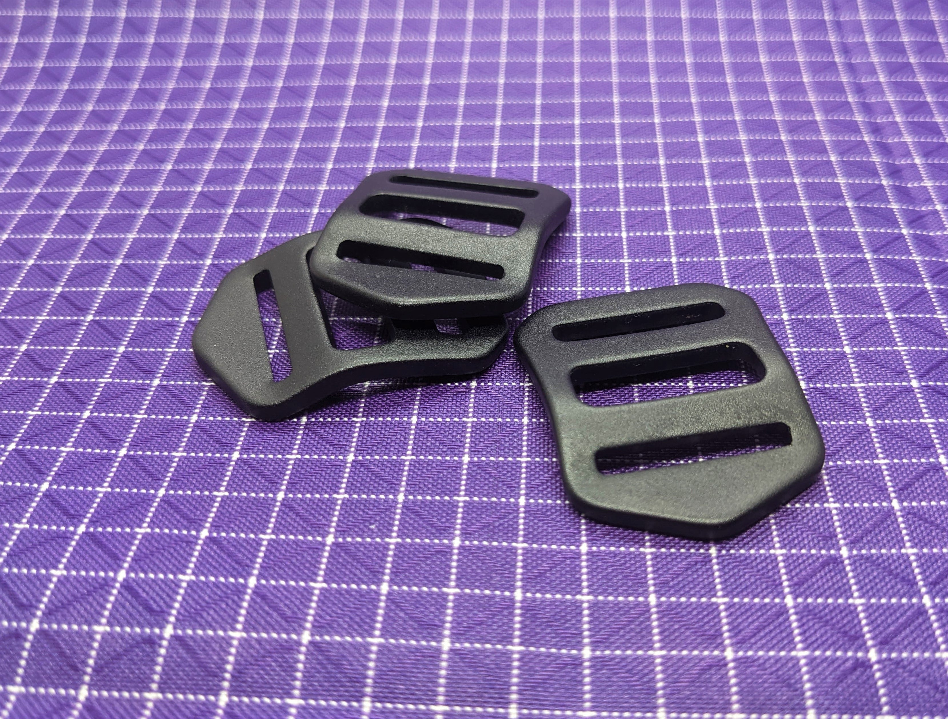 This is a high-quality, aluminum strap adjuster that is perfect for using with backpack straps. The aluminum is both strong and light!