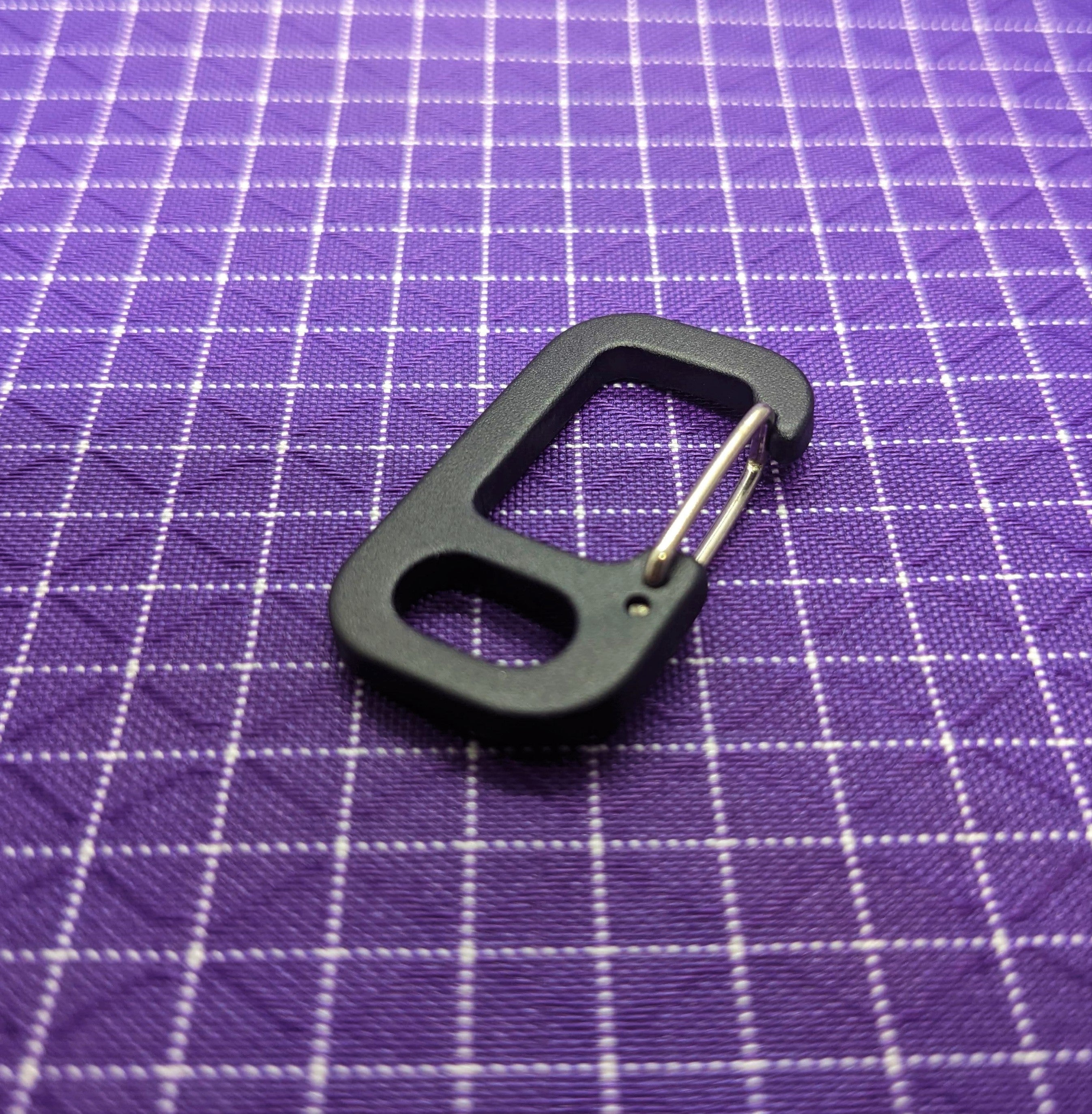 These WeTOOL mini clip hooks are very popular among backpack and fanny pack makers. They can be a great addition to the inside of a zippered pocket, allowing you to clip your keys or other small items too!