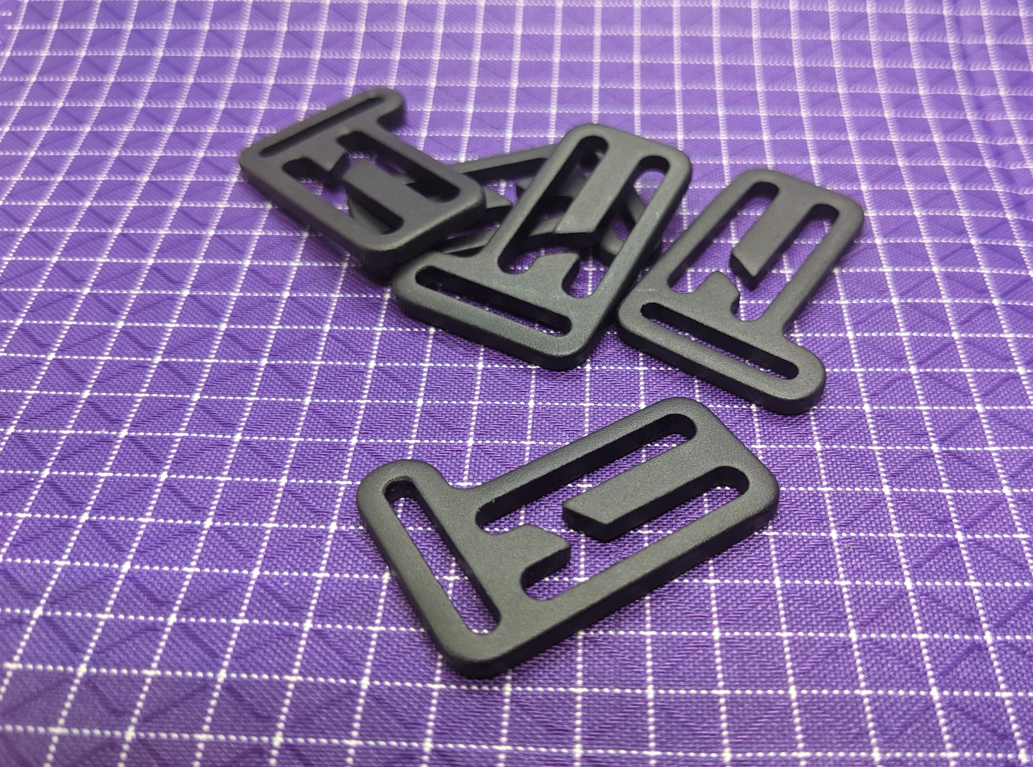 Aluminum WeTOOL Toggle that can be secured using cord and used with backpacks, tents, bags, and more! Use this when making your own gear!