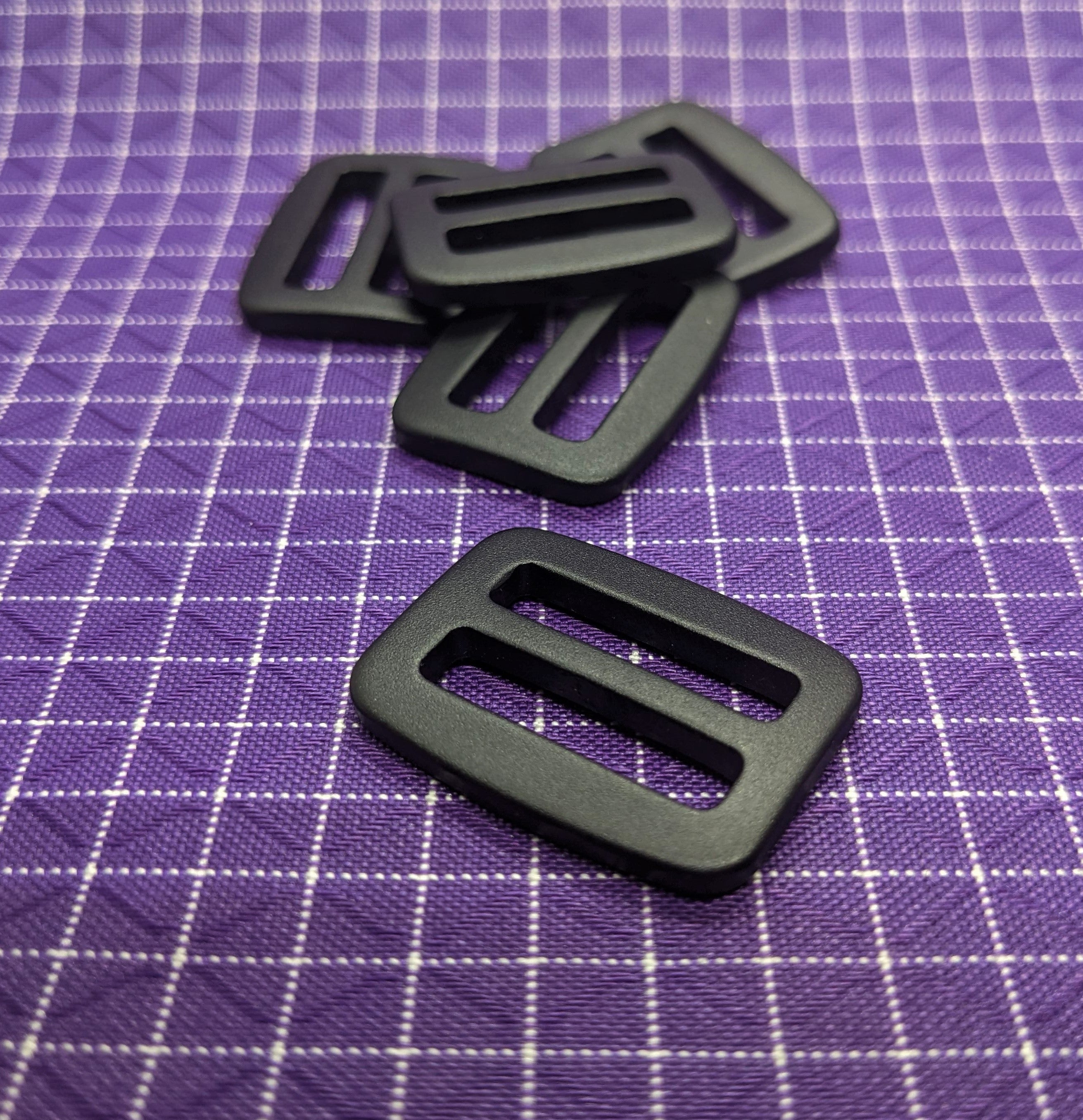 These universal strap adjuster loops can be used when sewing backpacks and bags to help keep tension and adjust webbing straps.