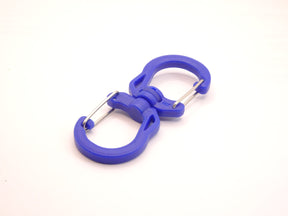 Mozet Supplies' double carabiner joined in the middle by a swivel point. Available in Small, Medium, and Large and in a variety of colors. Intended to secure lighter weight items and attach to backpacks. These are the same type as the ones from Tom Bihn!