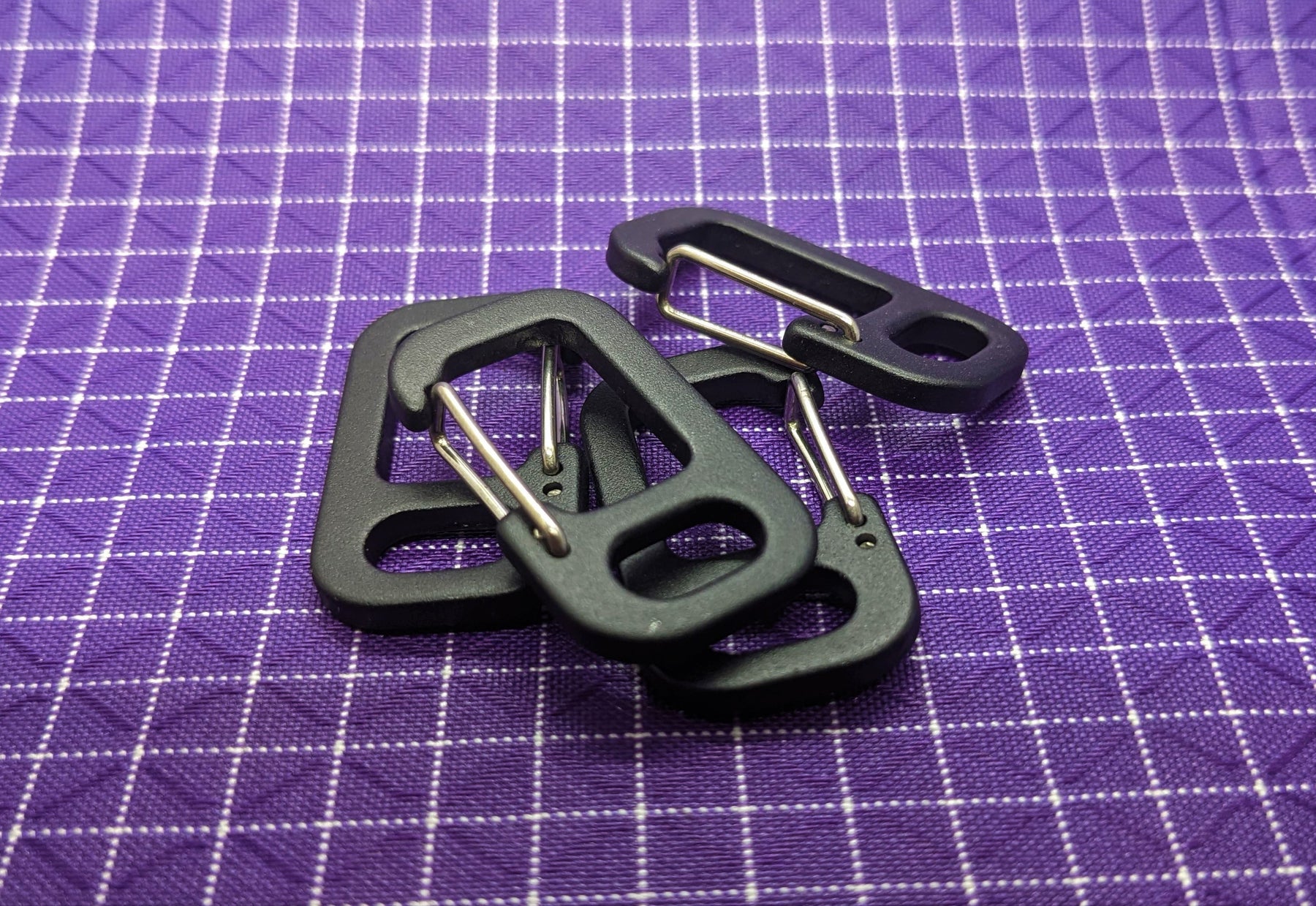 These WeTOOL mini clip hooks are very popular among backpack and fanny pack makers. They can be a great addition to the inside of a zippered pocket, allowing you to clip your keys or other small items too!